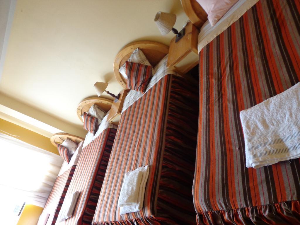 Hostal San Antonio Inn Puno Habitación foto